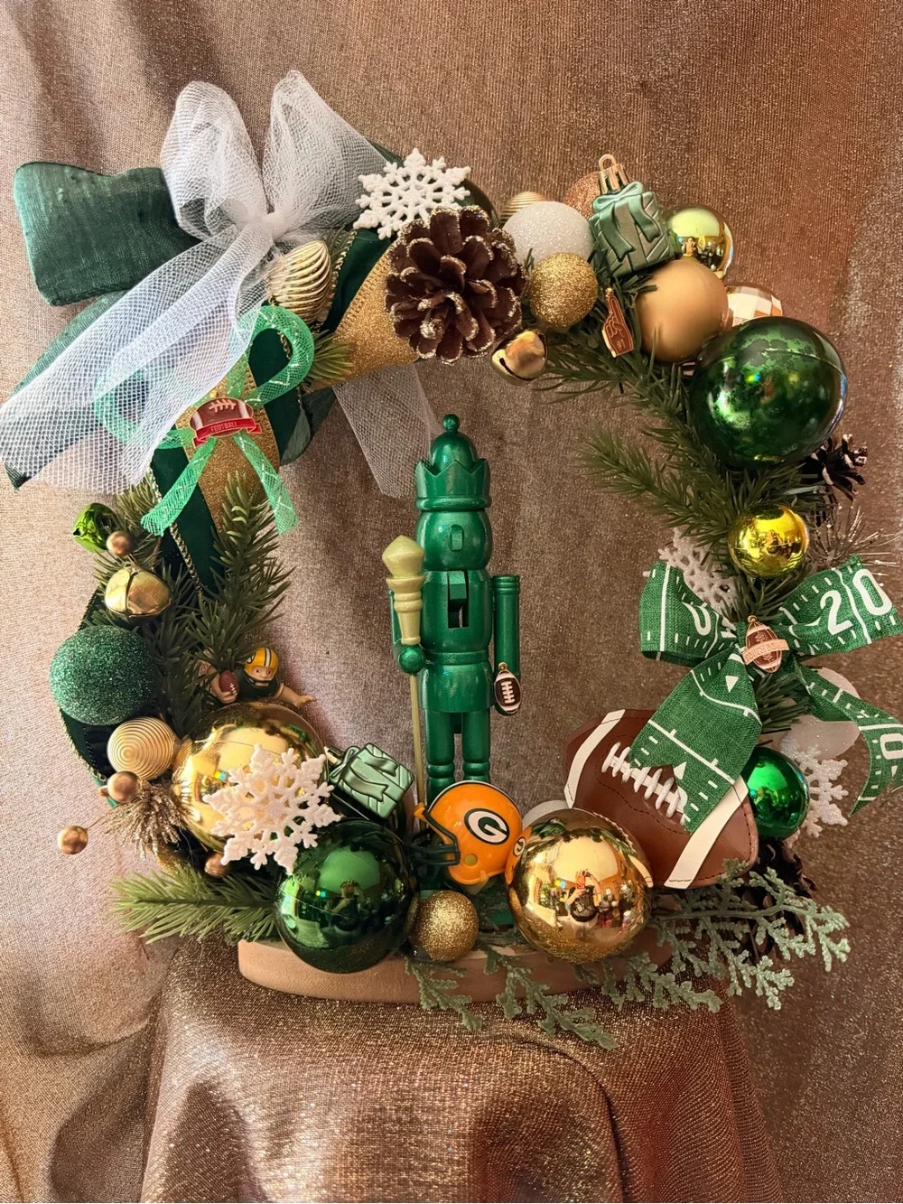 Green and Gold Holiday Wreath with Nutcracker Accent - table centerpiece